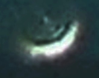 Crop of UFO enlarged darkened for clarity